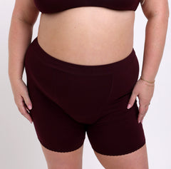Load image into Gallery viewer, 2XL woman wearing certified organic cotton boxer underwear in black cherry
Soft, breathable fabric with no side seams
