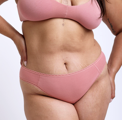 Load image into Gallery viewer, Size L Model showing front view of Organic Cotton Rose Mid Rise Brief
Super soft, breathable cotton fabric with high cut sides and sewn down gusset