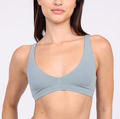 Load image into Gallery viewer, Size X-small Woman showing front view of comfortable organic cotton scoop neck bralette with lace detail