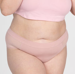 Load image into Gallery viewer, Front view of XXL woman wearing organic cotton high rise brief underwear style in blush pink color
