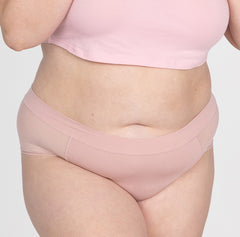 Load image into Gallery viewer, Front view of XXL woman wearing organic cotton high rise brief underwear style in blush pink color
