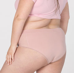 Load image into Gallery viewer, Back butt view of XXL woman wearing blush pink organic cotton high rise brief organic cotton underwear
