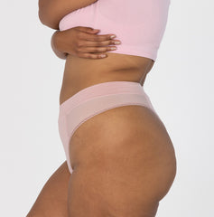 Load image into Gallery viewer, Side view of woman wearing ultra comfortable high waisted thong underwear made from organic cotton, detail shot of side waistband view
