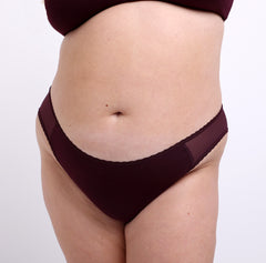 Load image into Gallery viewer, Size 2XL model showing front view of Certified Organic Cotton Fabric Black Cherry Mid Rise Brief
Sexy non-toxic mesh side panels and a soft lace trim
