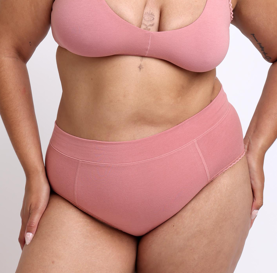 Size L model showing front view of certified organic cotton high rise brief in desert rose
Soft, breathable fabric with no side seams and cheeky coverage
