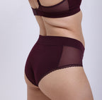 XS Model showing back view of certified organic cotton high rise brief with sexy side mesh panels