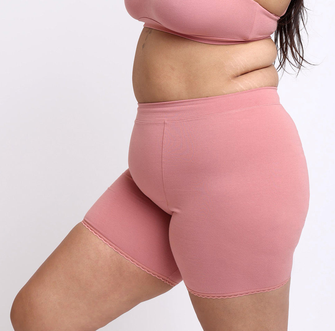 Size L woman showing side view of certified organic cotton boxer underwear in desert rose
No side seams, longer inseam, anti-chafing for under dresses